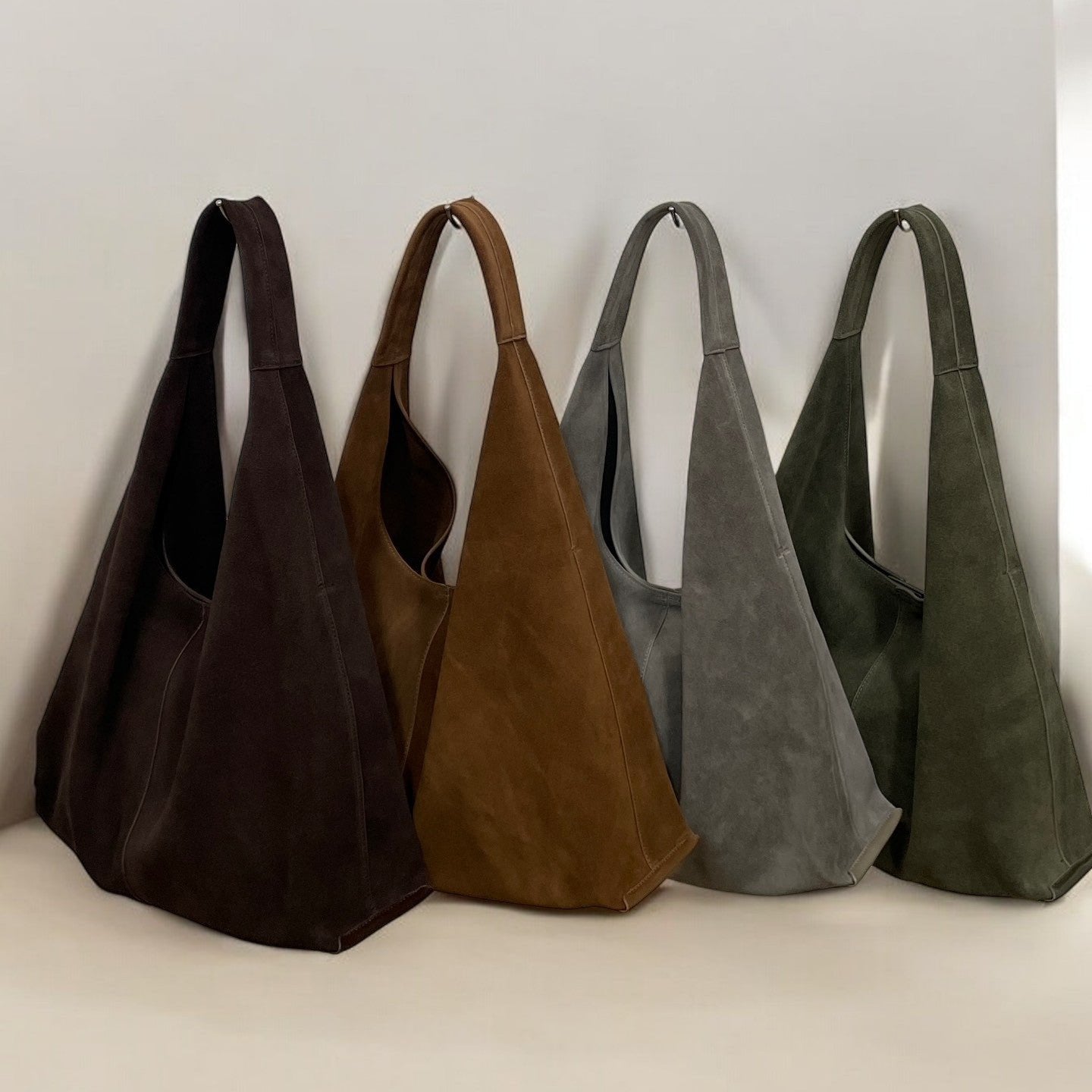Naomi 2024 Autumn/Winter suede triangle tote bags in various colors with large capacity and genuine leather design.