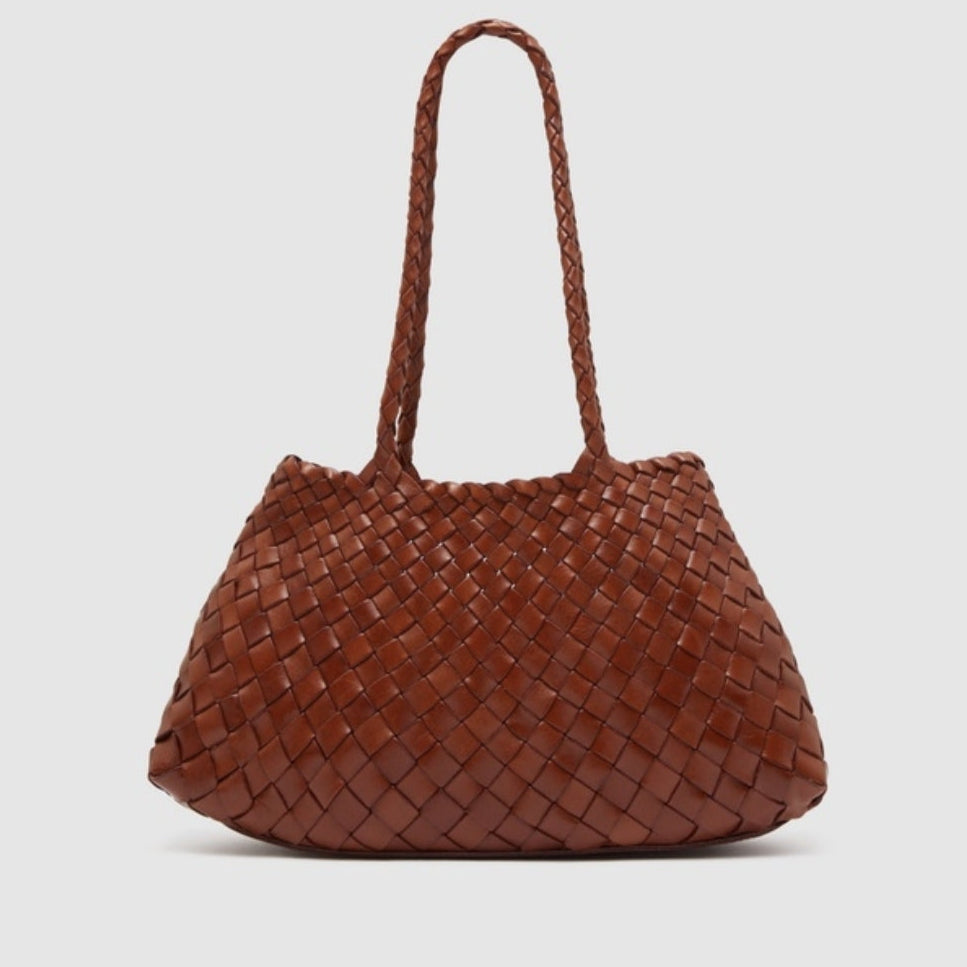 Brown handmade top layer cowhide leather woven tote bag with long handles.