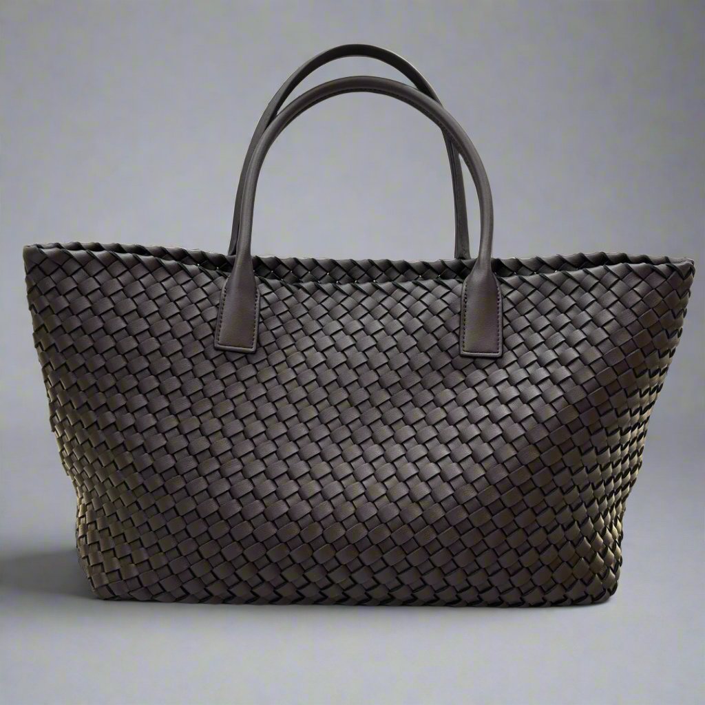 June Large Leather Woven Tote with minimalist design and premium cowhide leather construction.