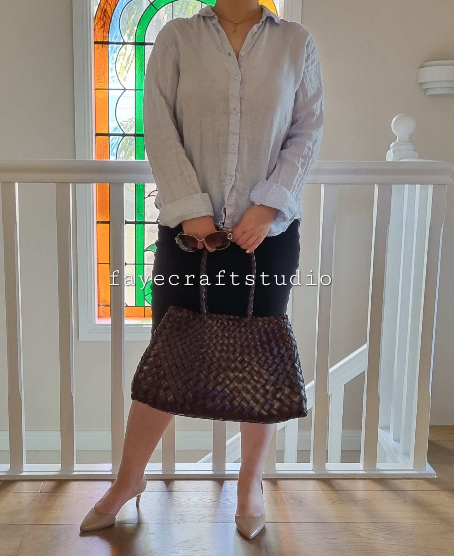 Model View Of Leah Large Handmade Leather Woven Tote Bag with Long Handles in Coffee Leather