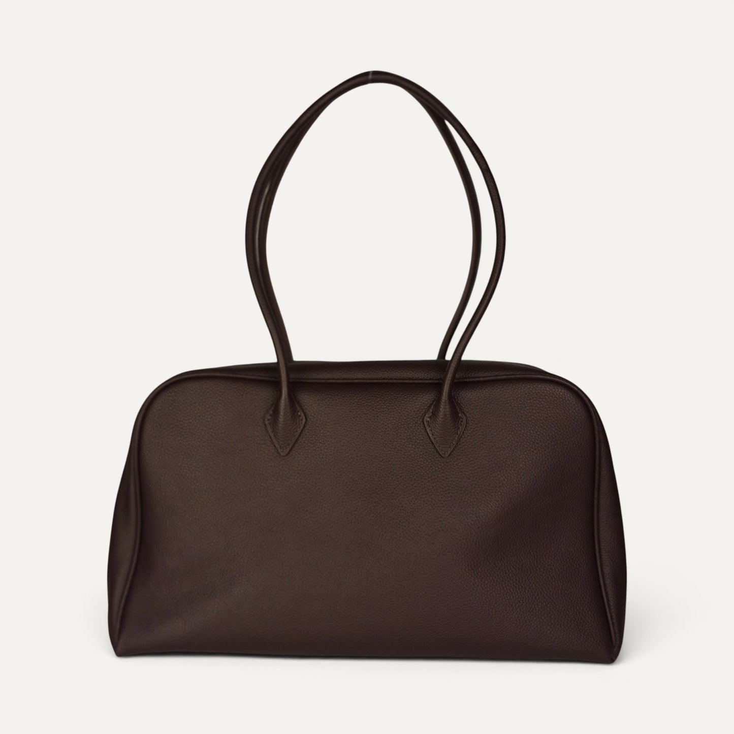 Belle coffee full-grain leather shoulder bag with elongated silhouette and double shoulder straps