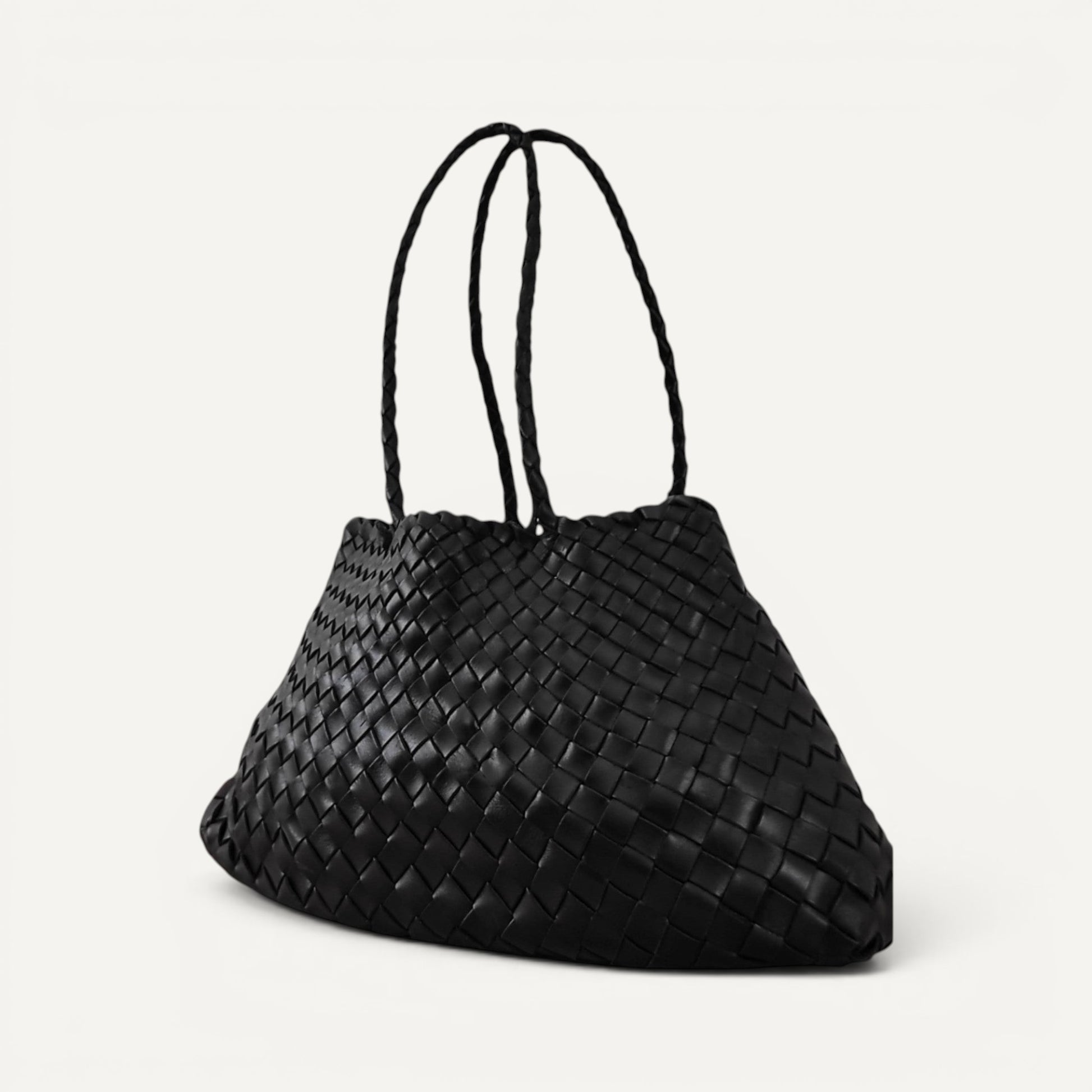 Side View Of Leah Large Handmade Leather Woven Tote Bag with Long Handles in Black Leather