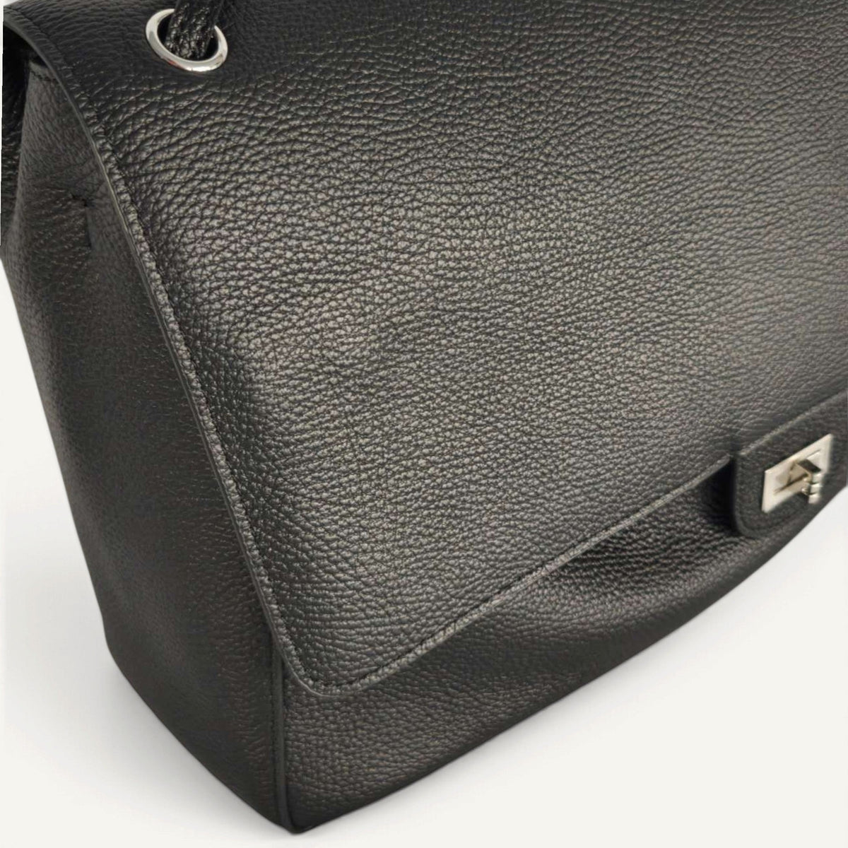 Fayecreations large black pebbled leather shoulder bag with silver metal hardware and a secure turn-lock closure.