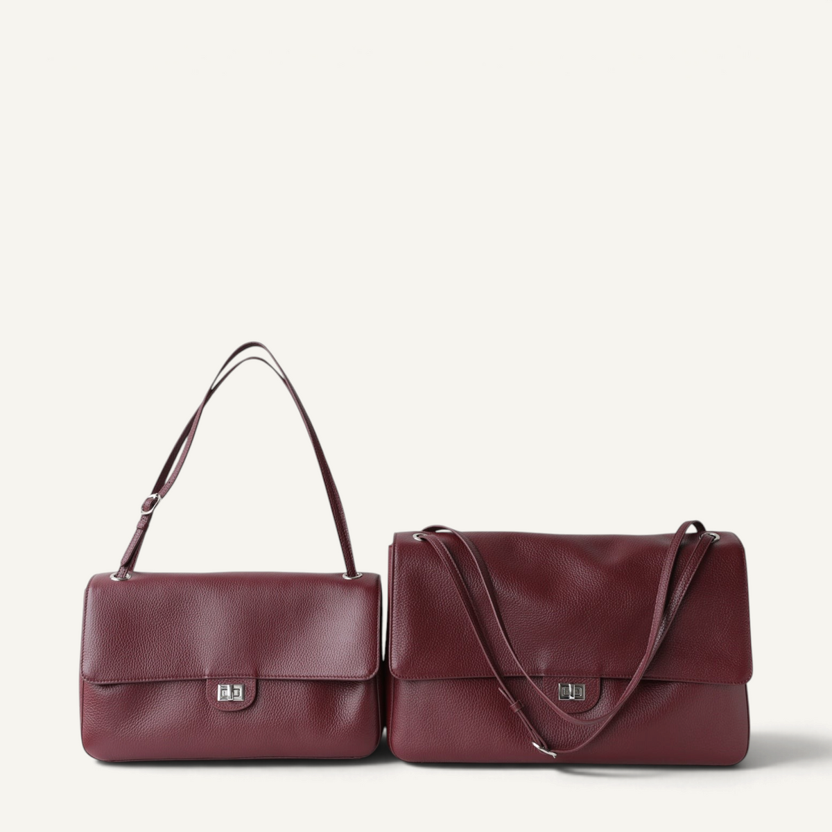 Two Fayecreations Eleanor large red leather shoulder bags with turn-lock closures and double straps
