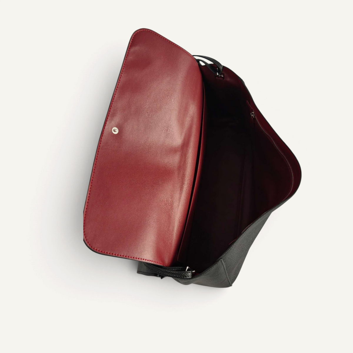 Fayecreations large black leather handbag with a contrasting deep red interior lining and magnetic snap closure