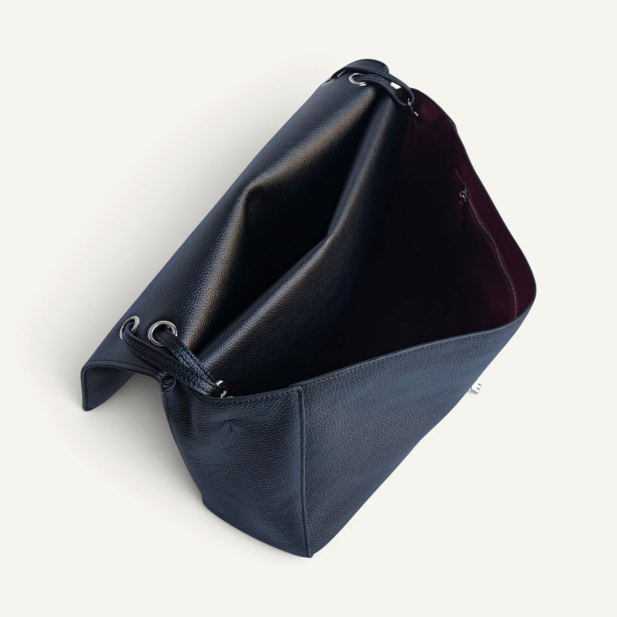 Fayecreations large black leather tote bag with a fold-over flap and deep burgundy interior lining