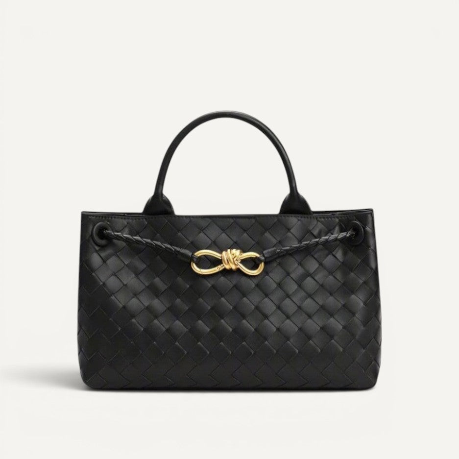 Aria crosswoven genuine leather shoulder bag with dual compartments and gold accent.