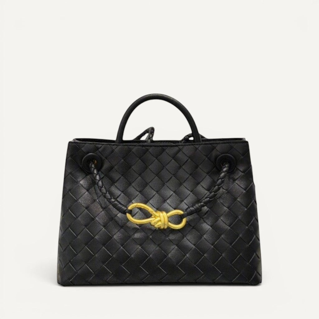 Jade crosswoven leather shoulder bag with dual compartments and gold accent.