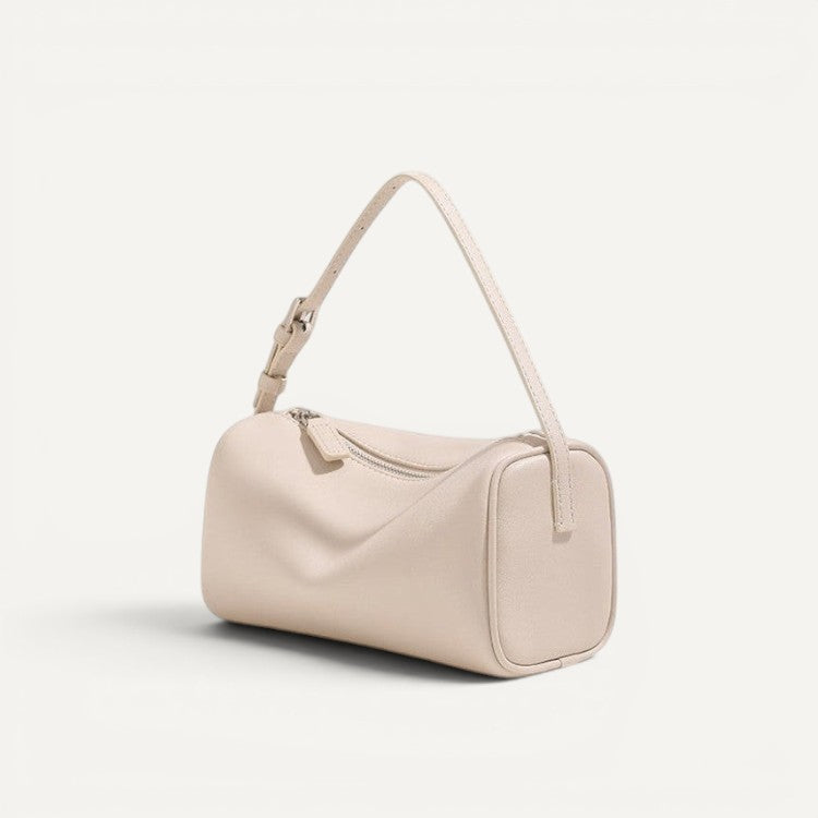 Beige handbag on a white background