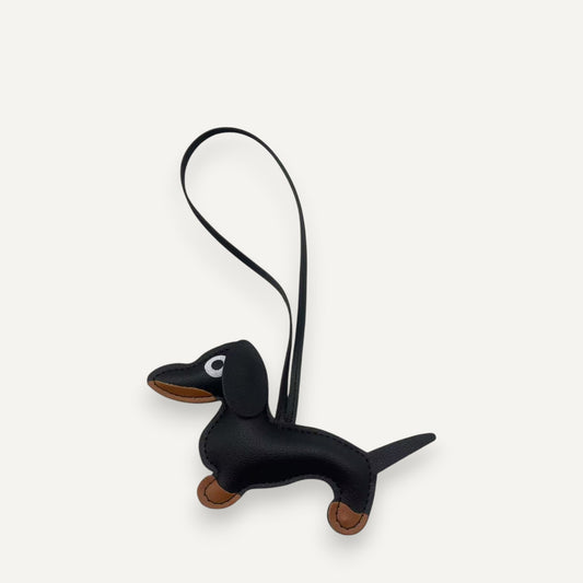 Handcrafted faux leather Dachshund dog bag charm in macaron color palette.