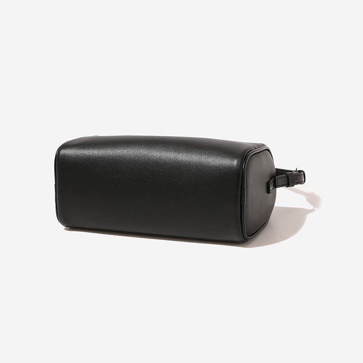 Black leather pouch on a white background