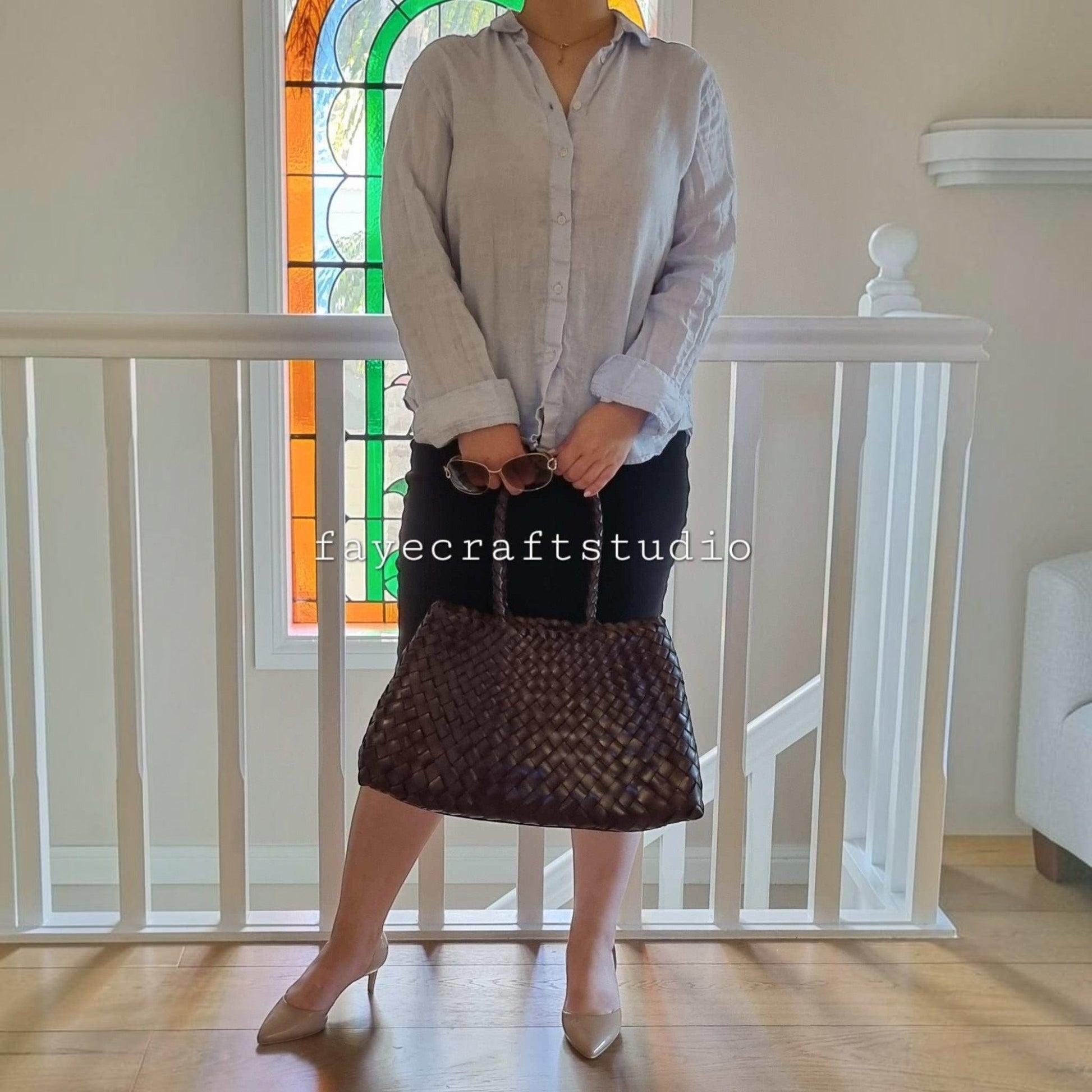 Model View Of Leah Large Handmade Leather Woven Tote Bag with Long Handles in Coffee Leather