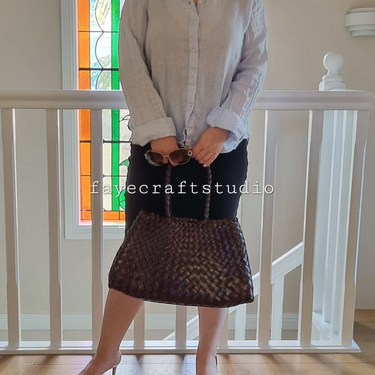 Model View Of Leah Large Handmade Leather Woven Tote Bag with Long Handles in Coffee Leather