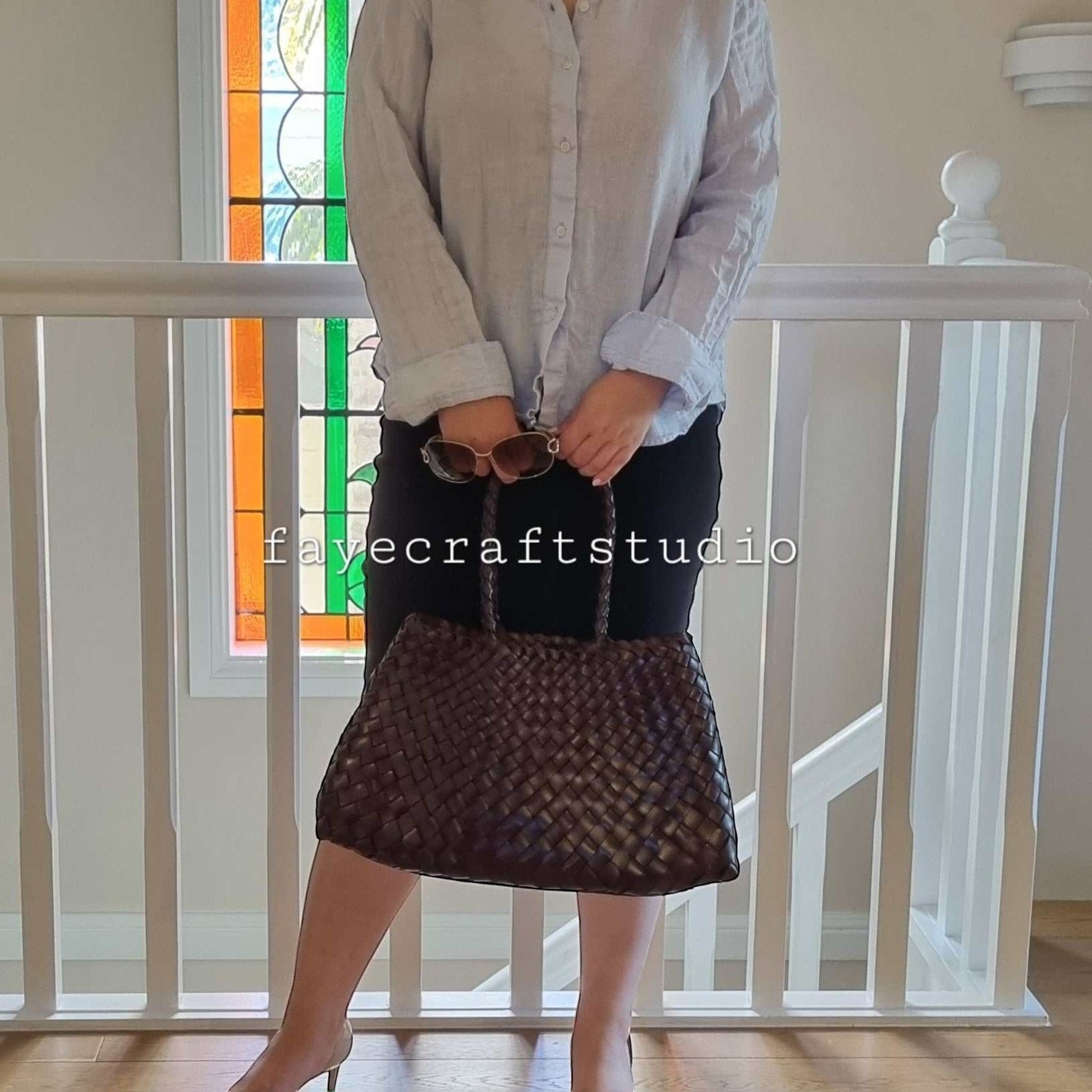 Model View Of Leah Large Handmade Leather Woven Tote Bag with Long Handles in Coffee Leather