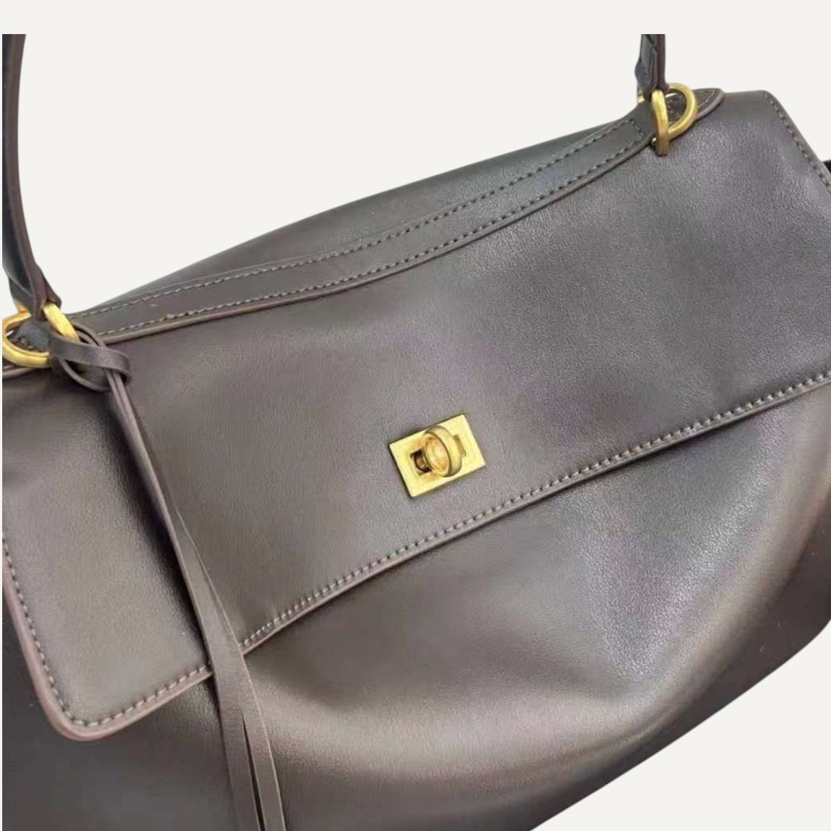Fayecreations Harper small structured dark brown cowhide leather shoulder bag with gold-tone lock closure.