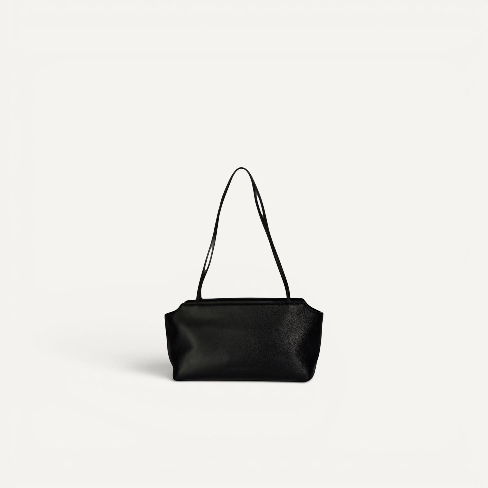 Black sheepskin shoulder bag for everyday use