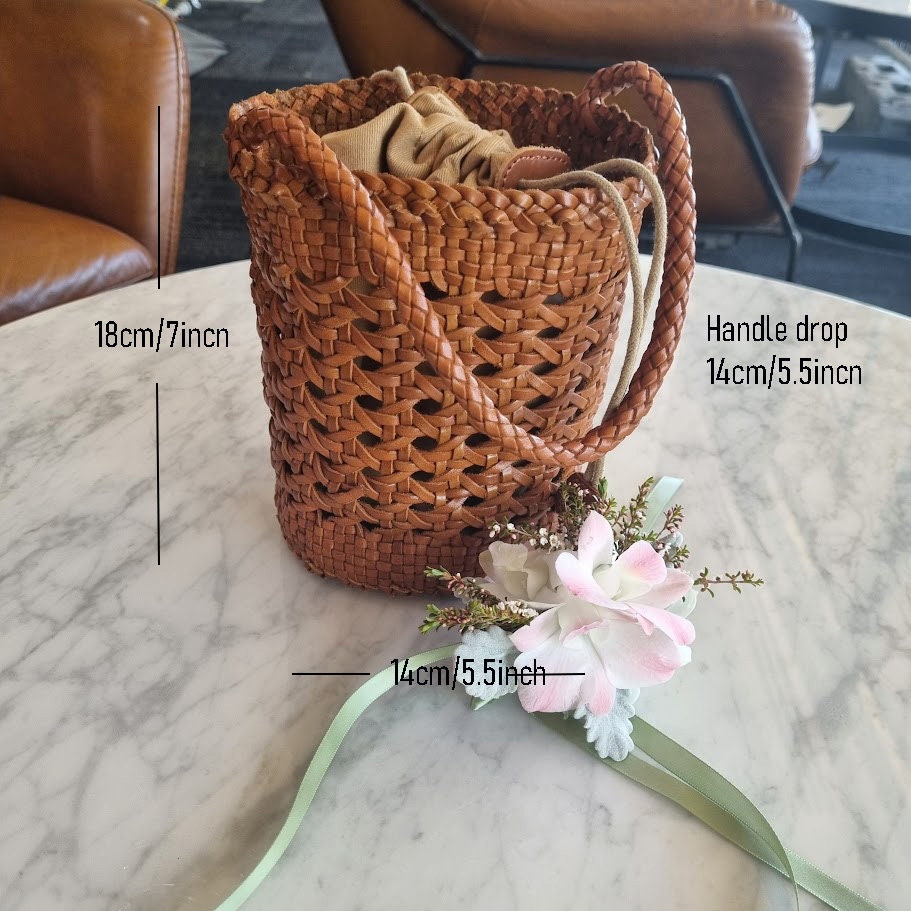 Handmade genuine leather open weave round basket