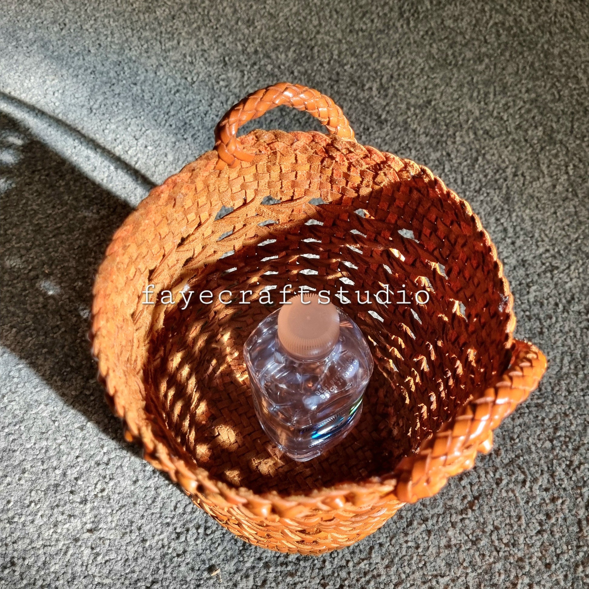 Handmade genuine leather open weave round basket