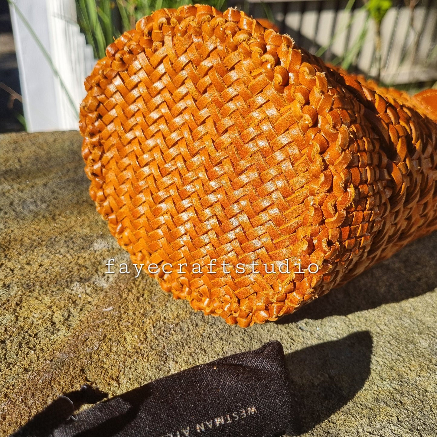 Handmade genuine leather open weave round basket