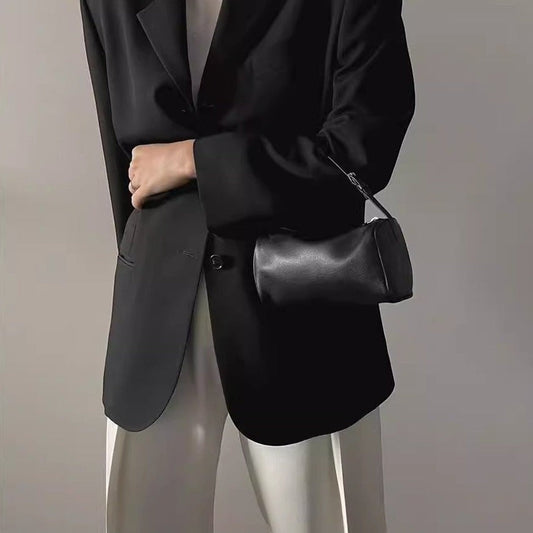 Alana Hand-Carry Leather Bag in genuine cowhide leather with sleek cylinder design and detachable strap