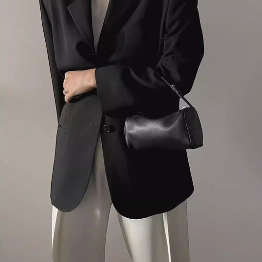 Alana Hand-Carry Leather Bag in genuine cowhide leather with sleek cylinder design and detachable strap