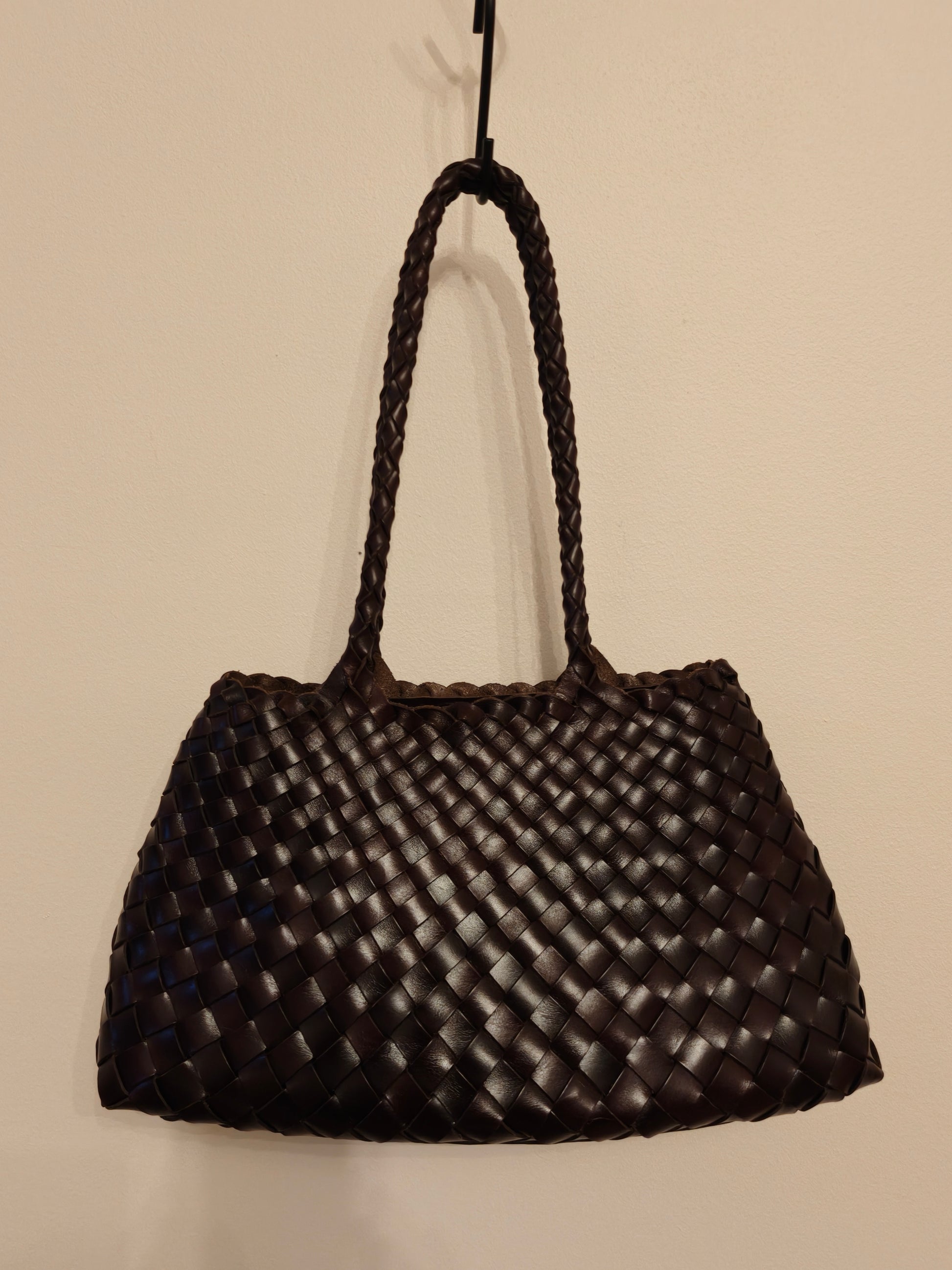 Front view of opal coffee woven leather tote bag with long handles