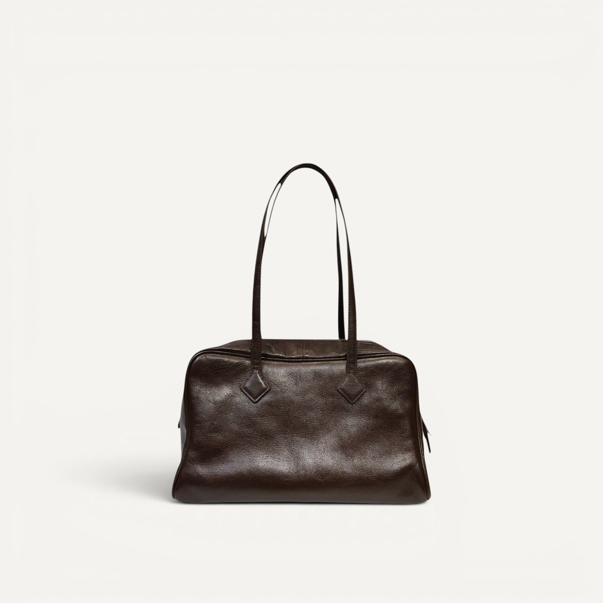 Box 35 full-grain leather structured tote bag with triple zippered compartments and shoulder handles