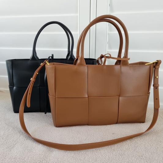 Brown and black Mila woven leather tote bags with adjustable straps for handheld, crossbody, and shoulder carry styles