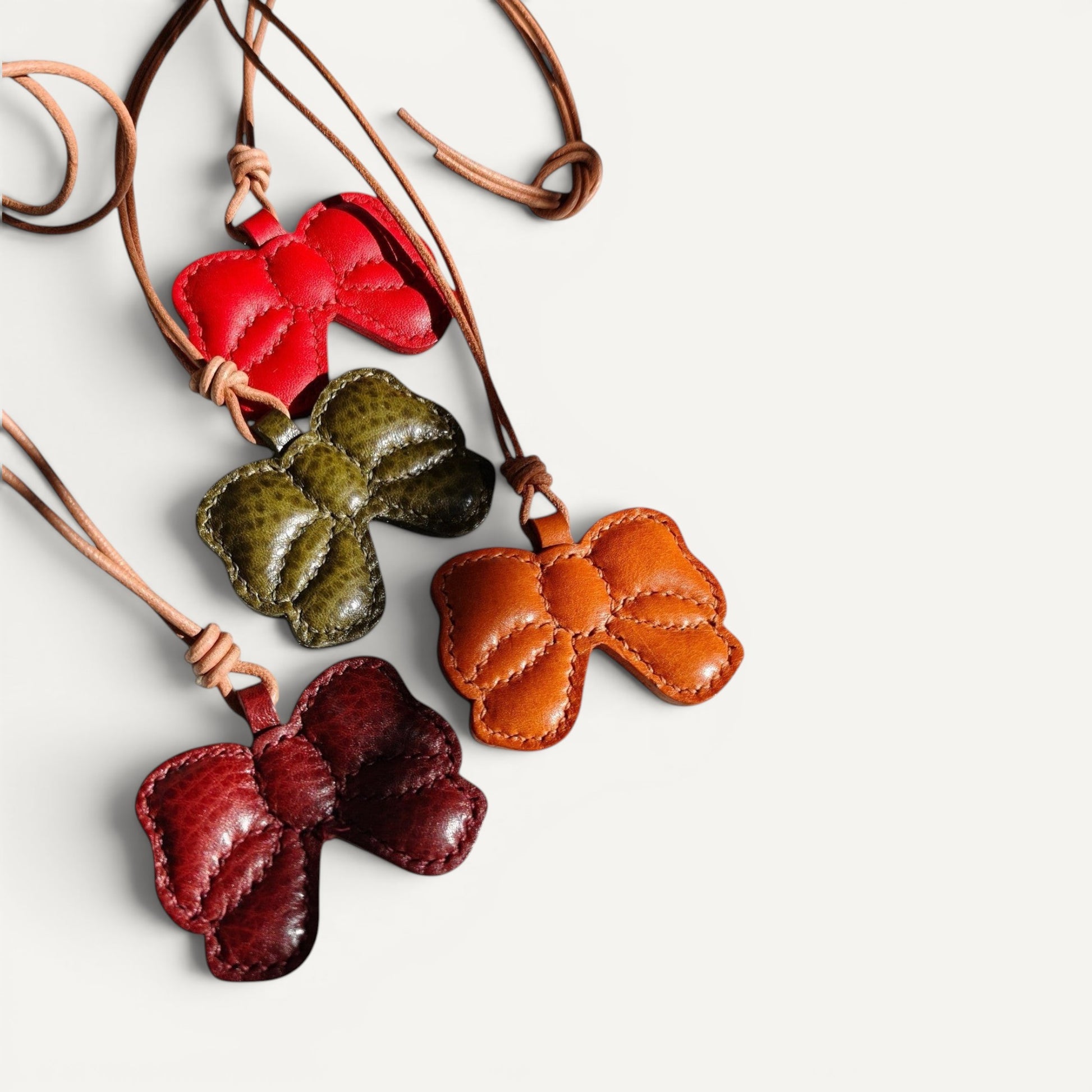 Handmade butterfly charm in colorful full grain leather.