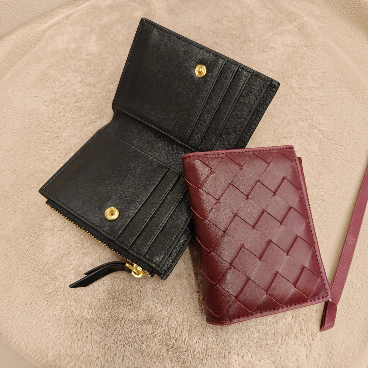 Lola Sheepskin Woven Short Wallet in black and red, showcasing open and closed views with card slots and woven pattern.