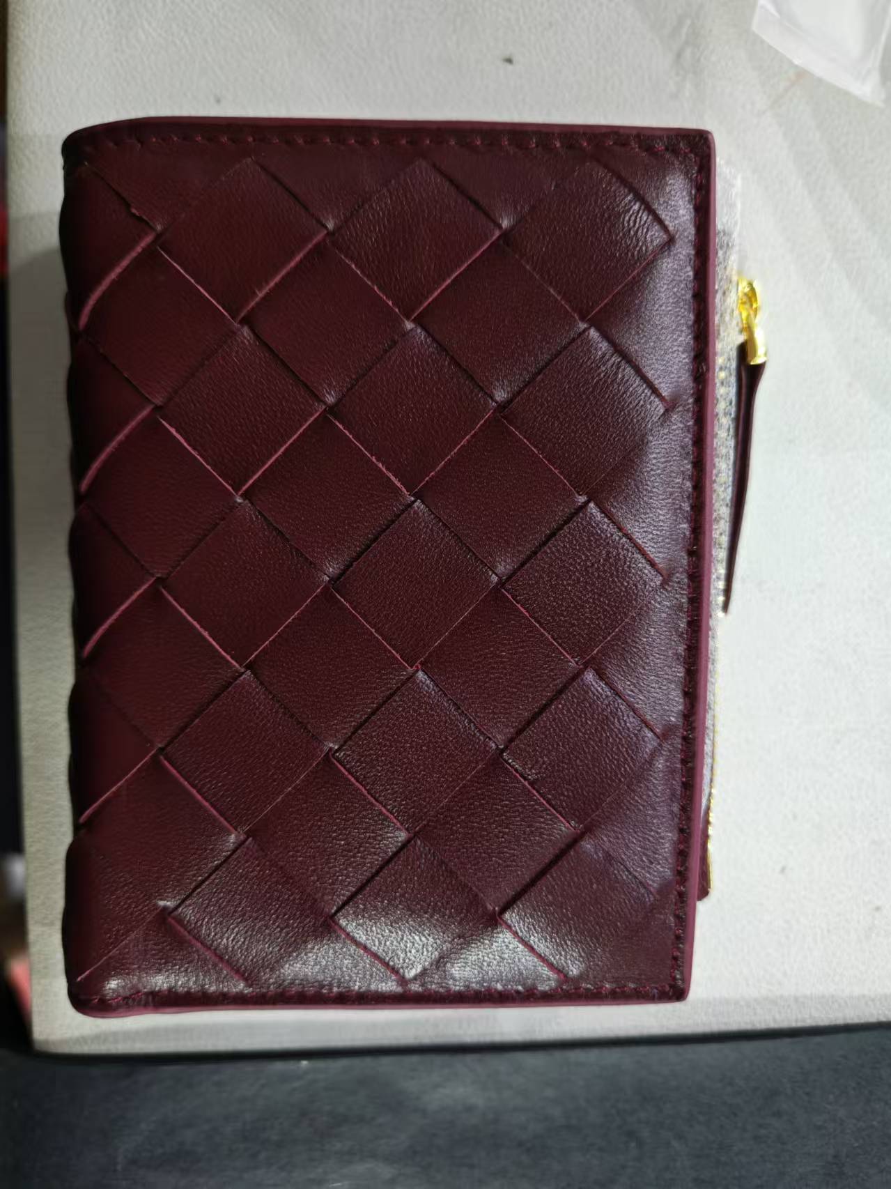 Lola Sheepskin Woven Short Wallet in burgundy leather with elegant woven design.