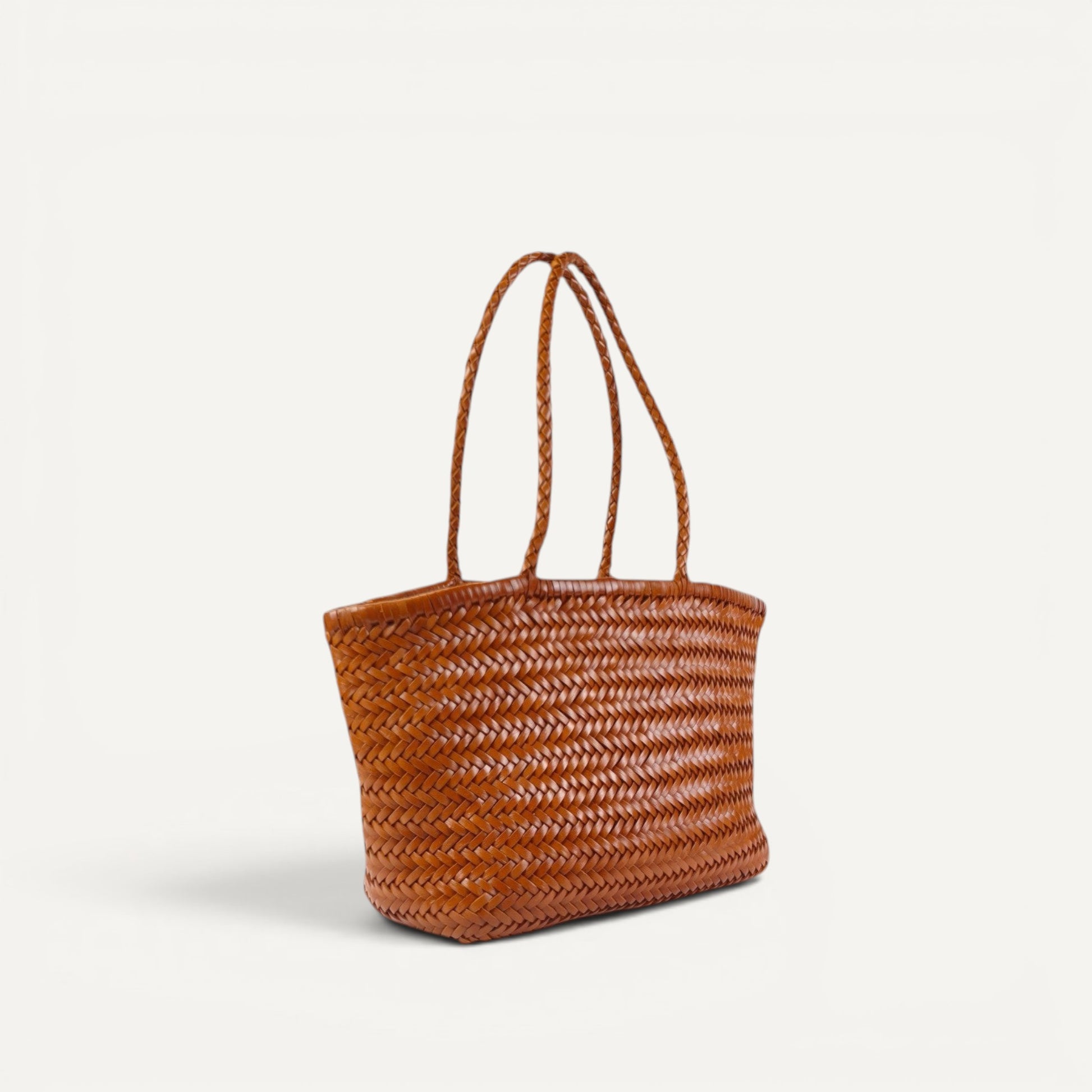Handwoven Lana tote bag made from 100% genuine top-layer cowhide leather with a soft, spacious shoulder design