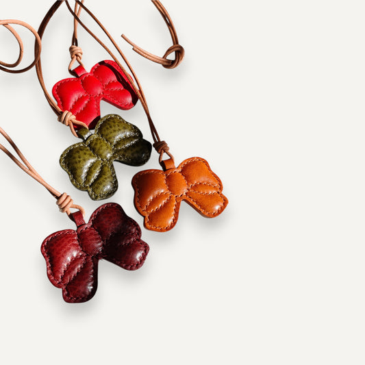 Handmade butterfly charm in colorful full grain leather.